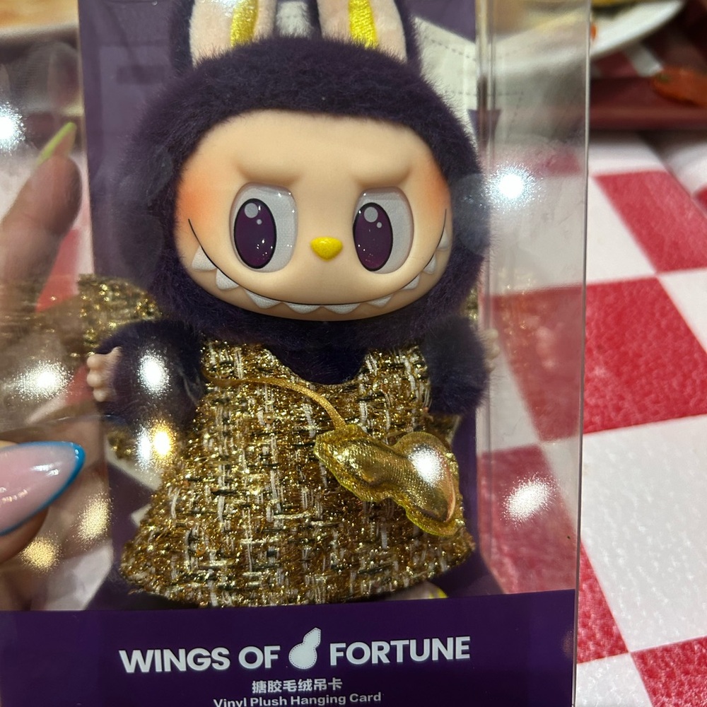 Wings of Fortune Plush Toy with Gold Outfit